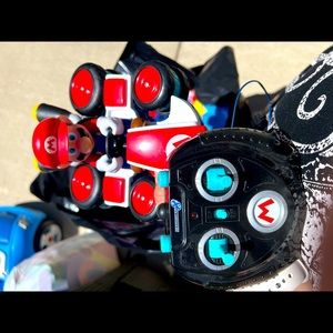 Super Mario Kart, with remote. Used once